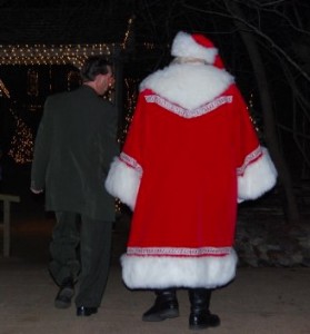 'Clarence' & Santa walk into the moonlight discussing their wonderful 2 months meeting thousands of kids & adults as well.